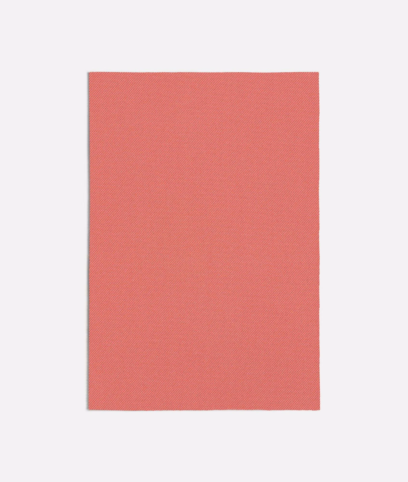 Muted coral-peach swatch with a fine diagonal woven texture