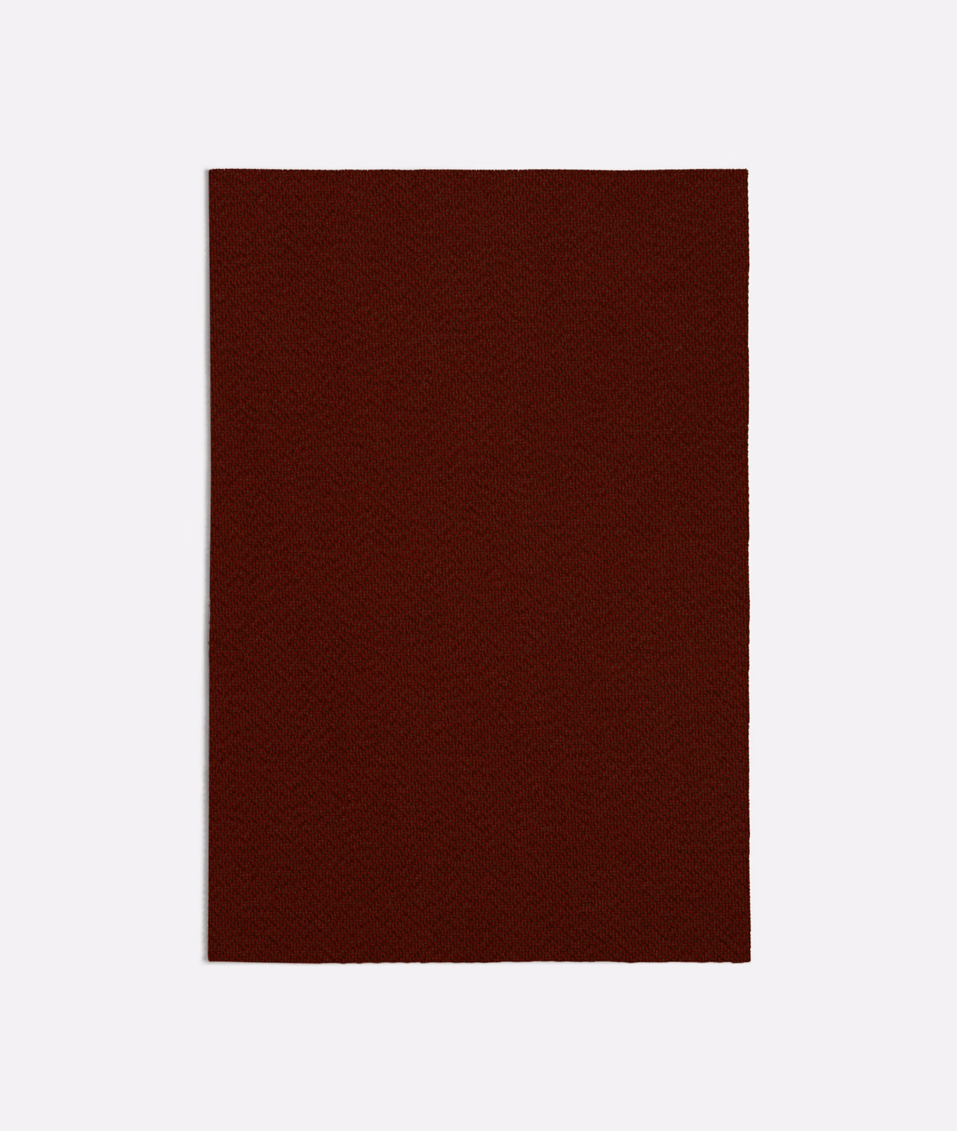 Deep oxblood terracotta fabric swatch with a fine, subtle woven texture