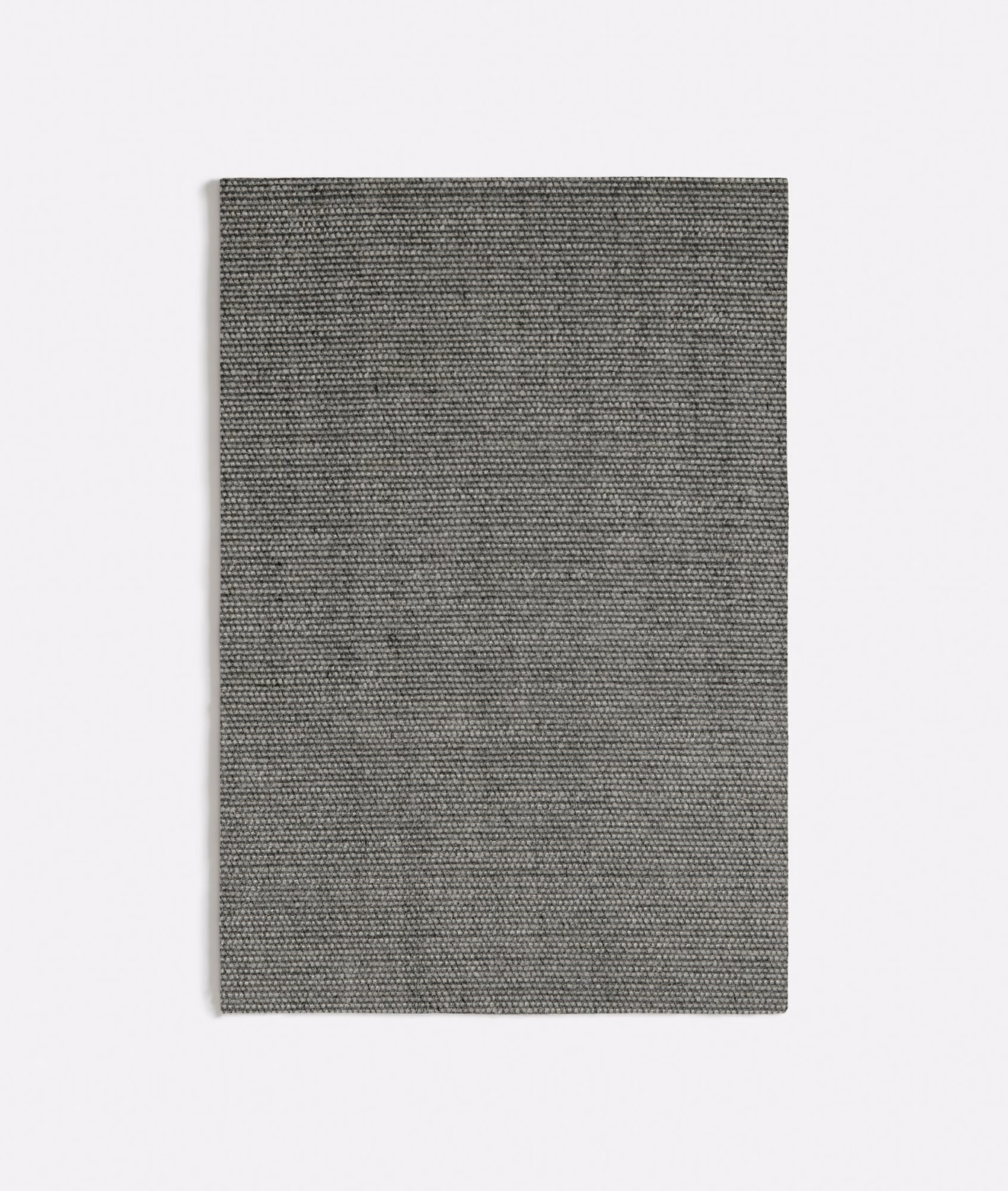 Close view of Ash Dark Grey's tight, fine charcoal-grey woven texture