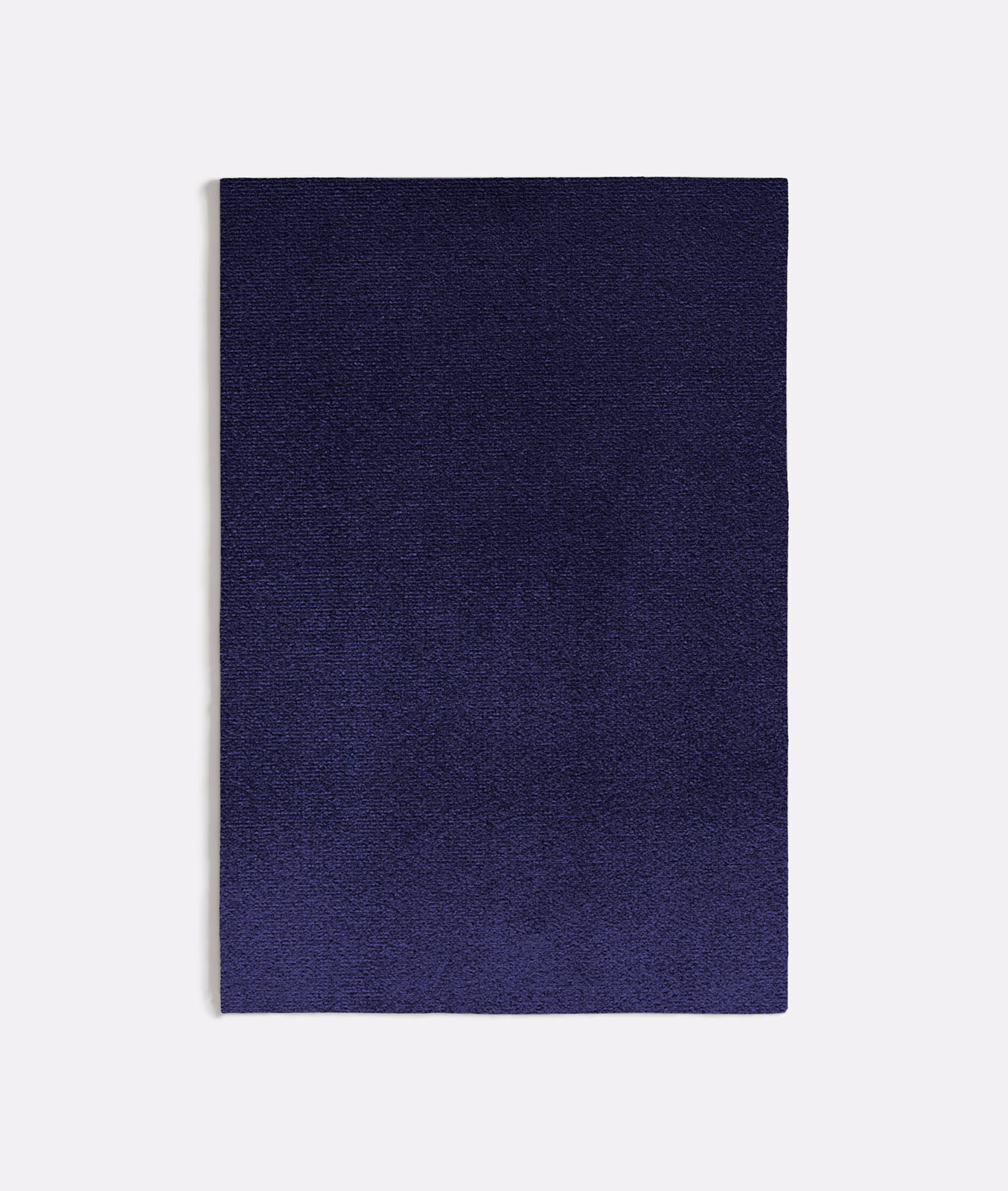 Deep indigo-blue swatch with subtle violet shading and a fine, softly textured surface