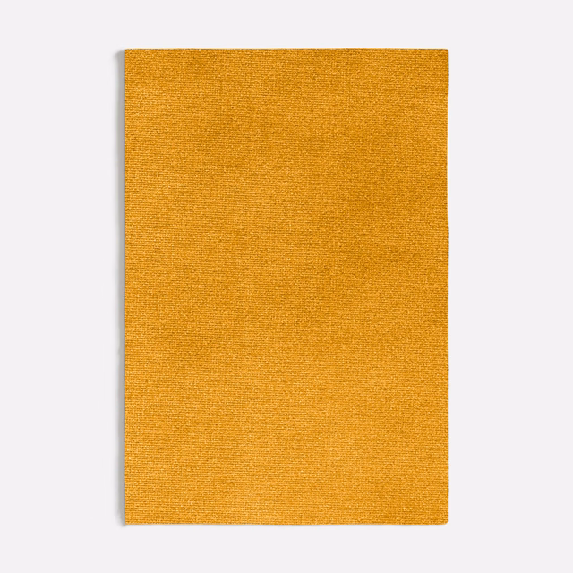 Warm amber-orange plain woven fabric swatch with a fine, subtly flecked texture