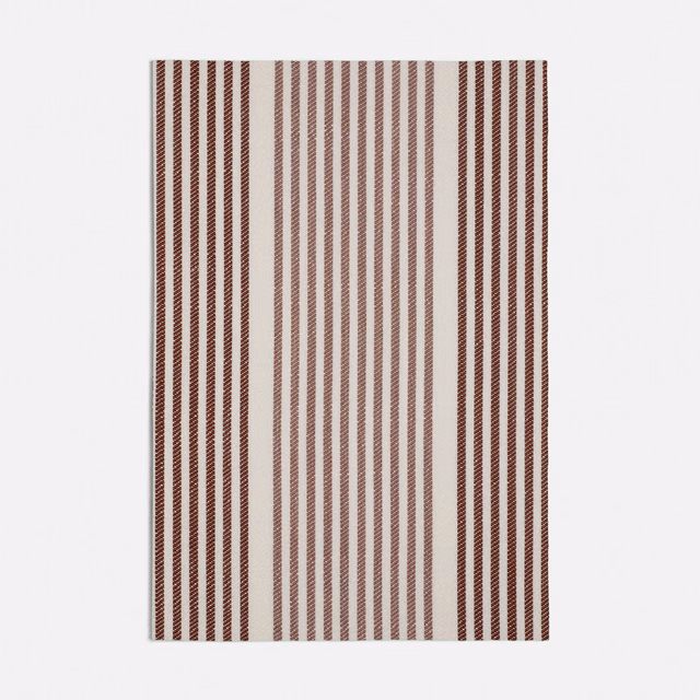 Warm terracotta and cream fabric with fine vertical woven stripes