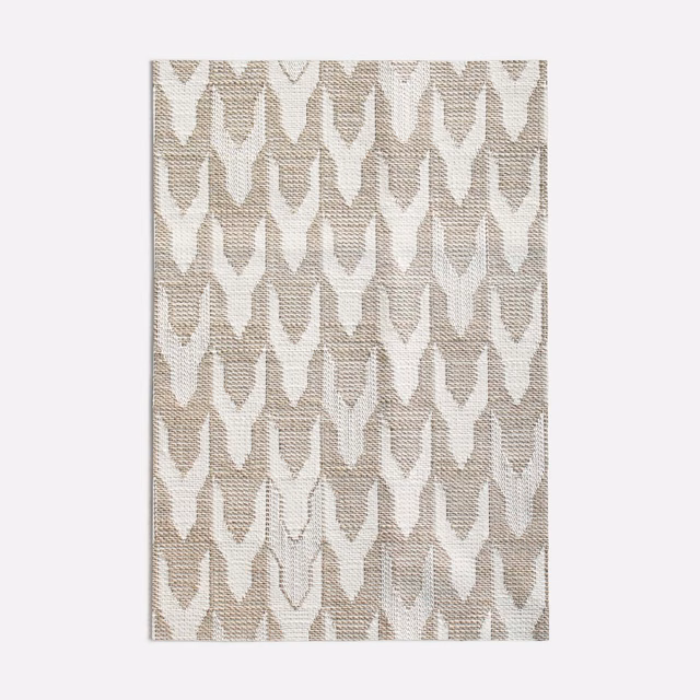 Warm beige and ivory woven fabric with repeating pointed geometric motifs