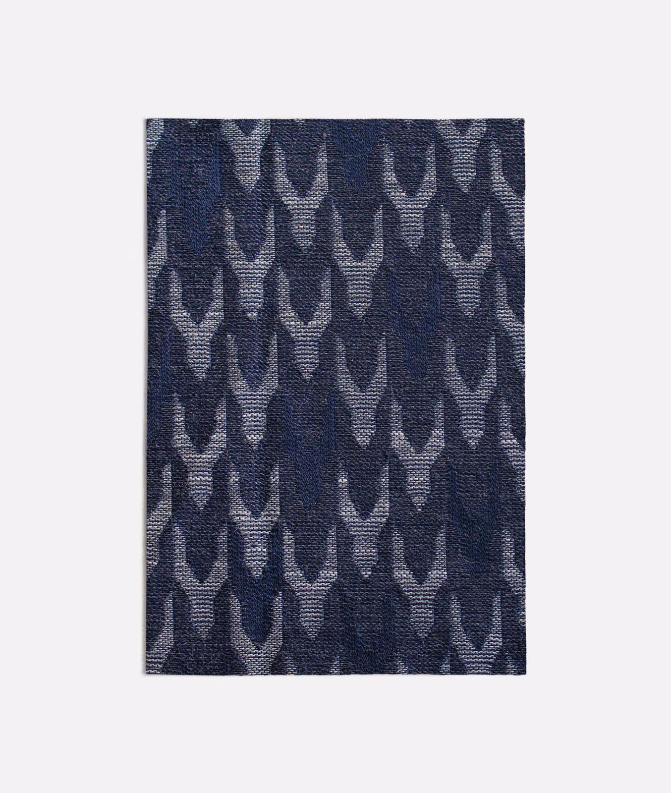 Dark navy woven swatch with pale grey repeating pointed leaf motifs