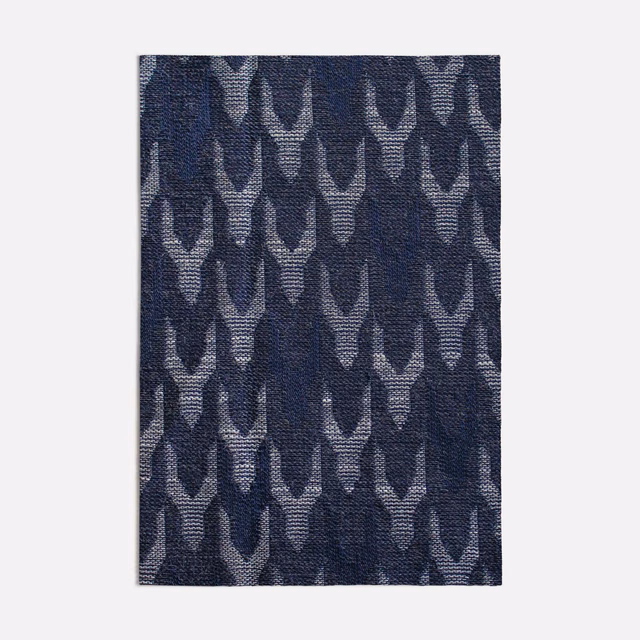 Dark navy woven swatch with pale grey repeating pointed leaf motifs