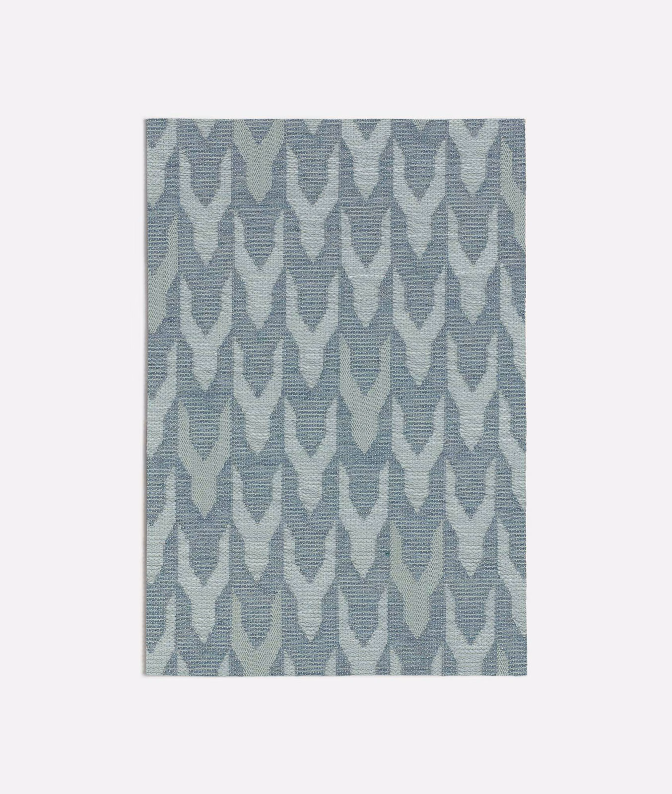 Seafoam-blue woven fabric with pale repeating geometric leaf shapes