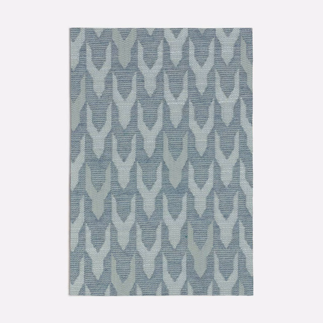 Seafoam-blue woven fabric with pale repeating geometric leaf shapes