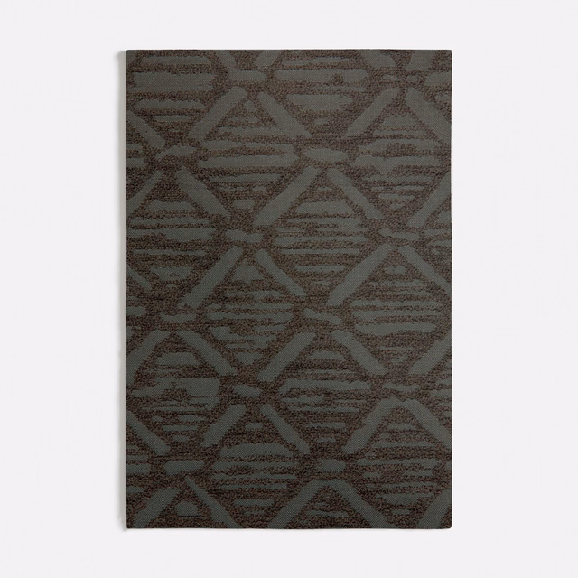 Dark moss-green woven swatch with interlocking triangles and horizontal striations