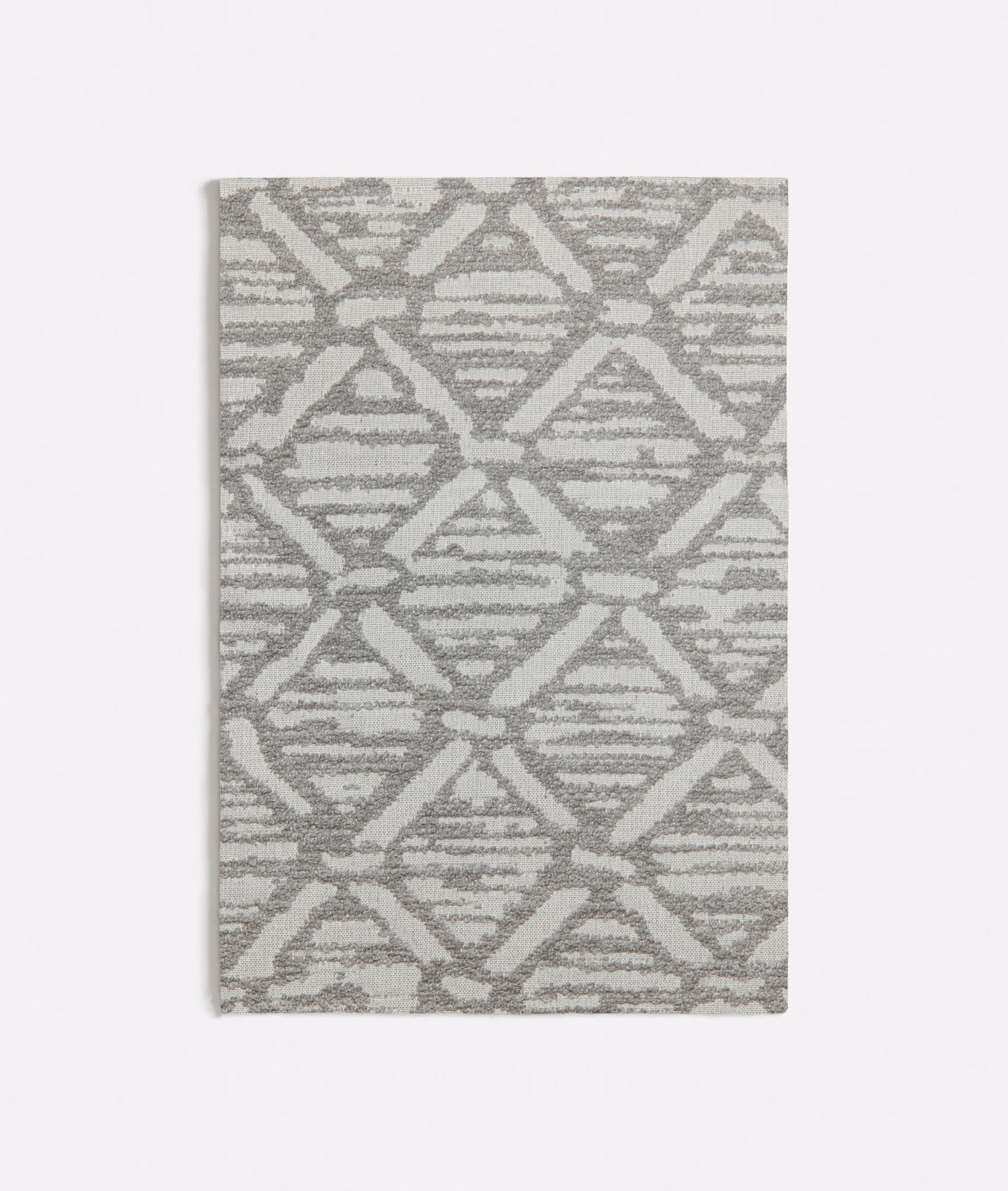 Cool grey woven swatch with interlocking triangles, diamonds and fine horizontal striations