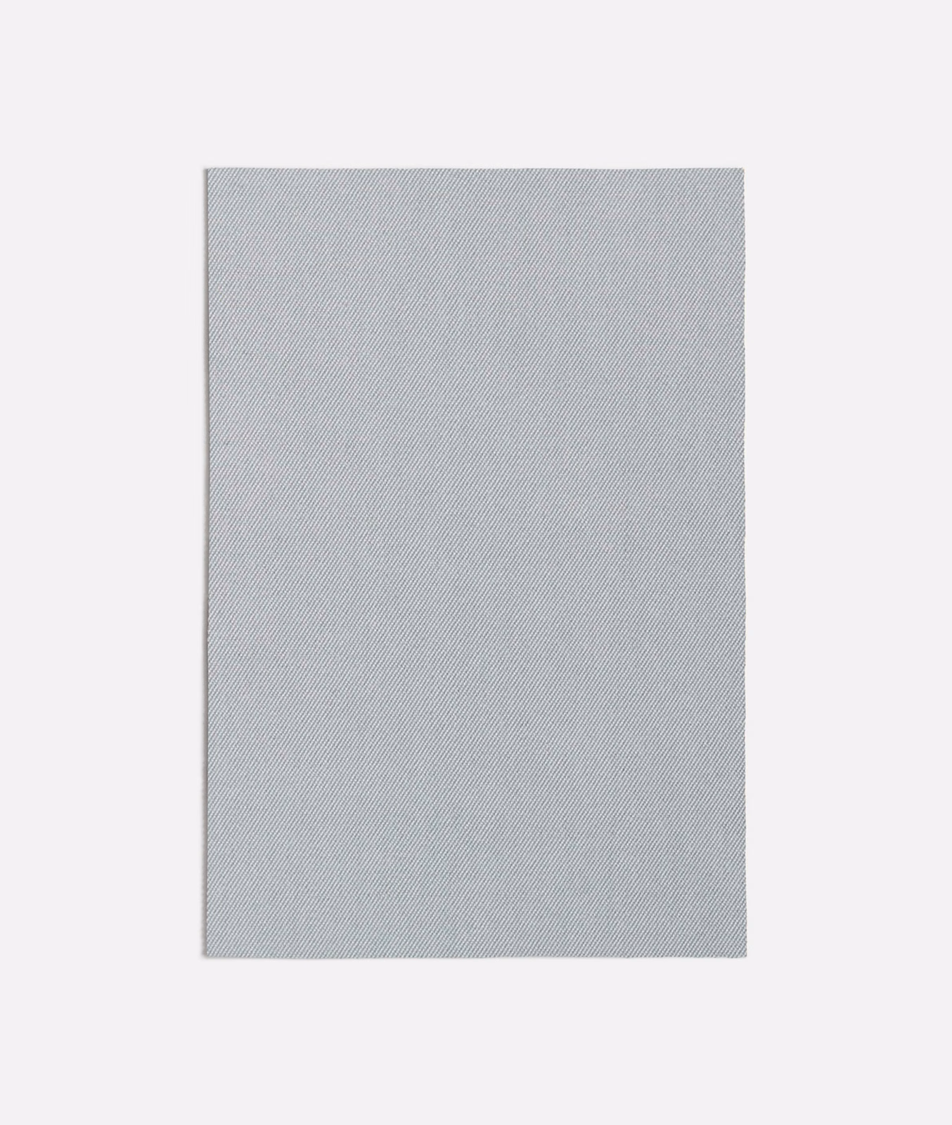 Pale seafoam-green fabric swatch with a fine, silvery diagonal weave