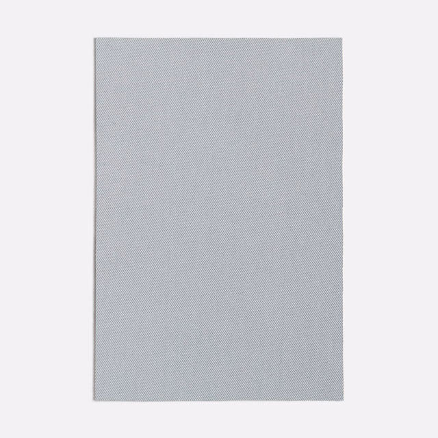 Pale seafoam-green fabric swatch with a fine, silvery diagonal weave