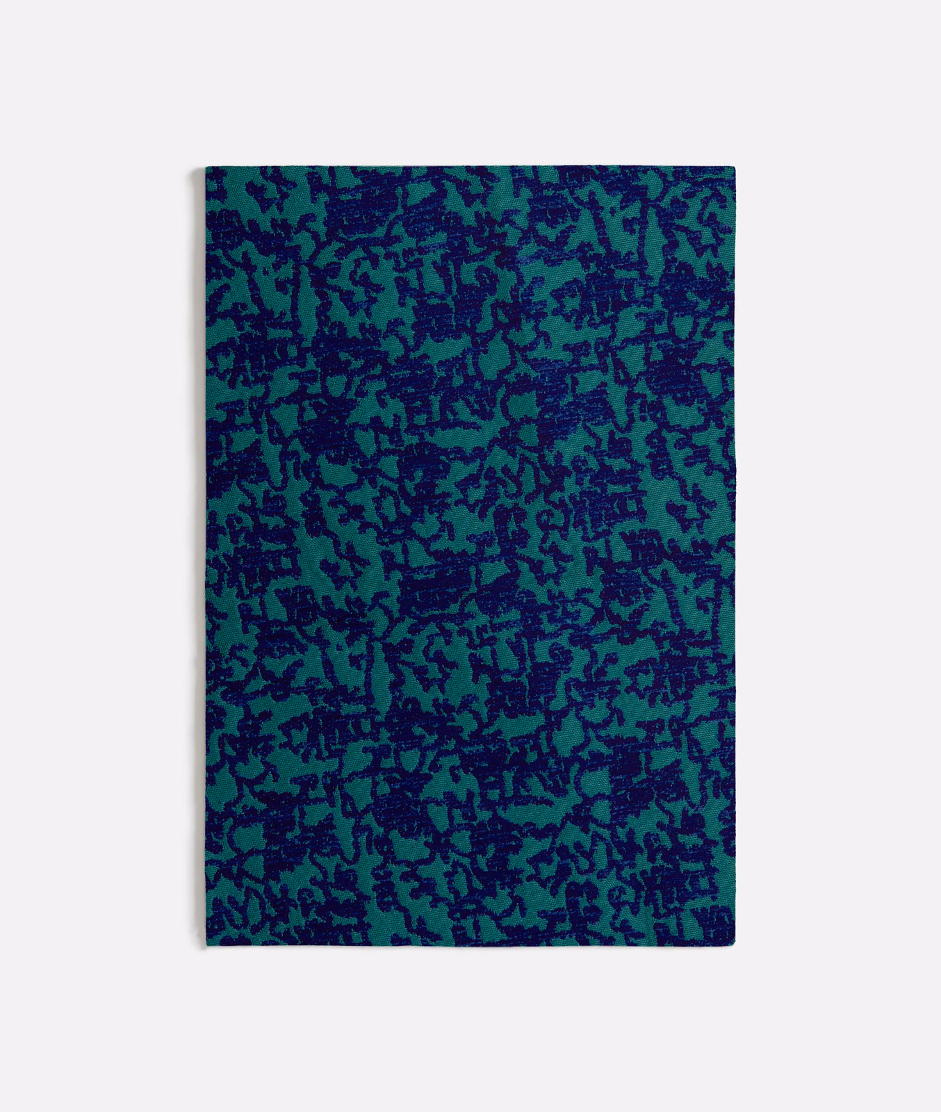 Seafoam teal fabric swatch covered in dense irregular navy botanical marks