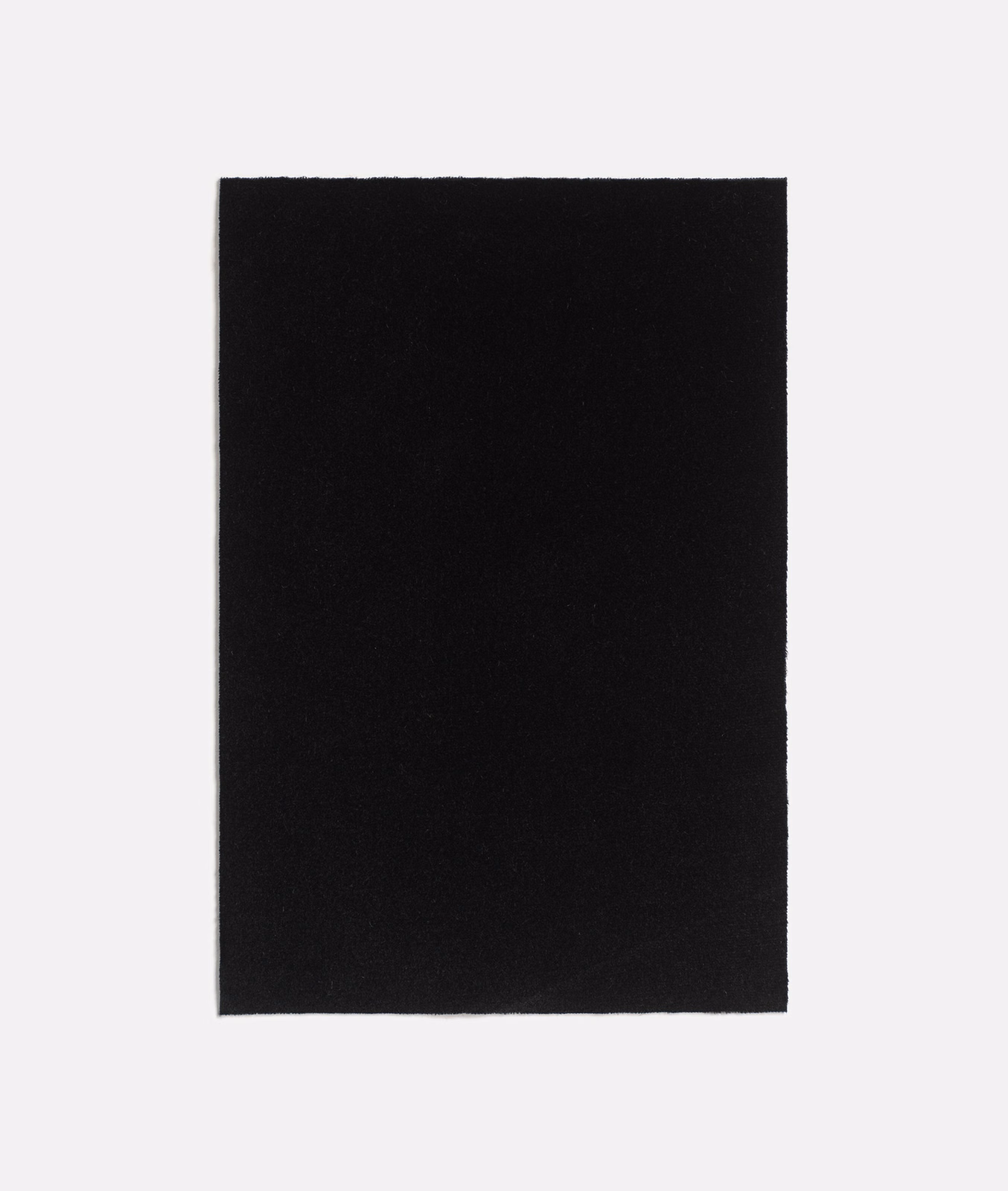 Deep black plain velvet swatch with a subtly light-catching directional nap