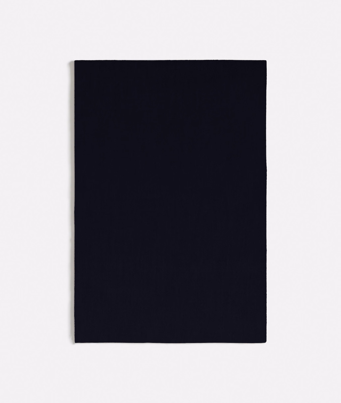 Plain near-black ink-blue velvet swatch with a subtly shifting pile
