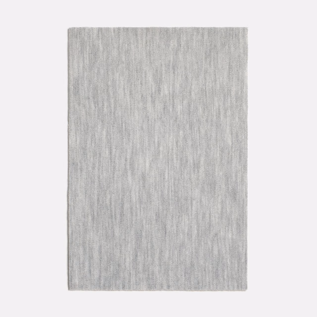 Pale cool-grey velvet swatch with softly mottled vertical pile texture