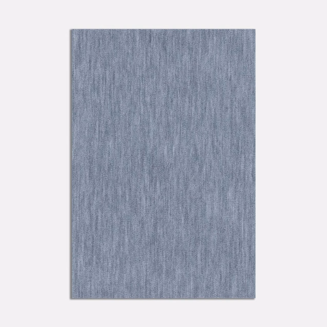 Cool blue-grey velvet swatch with fine vertical nap and softly varied tonal texture