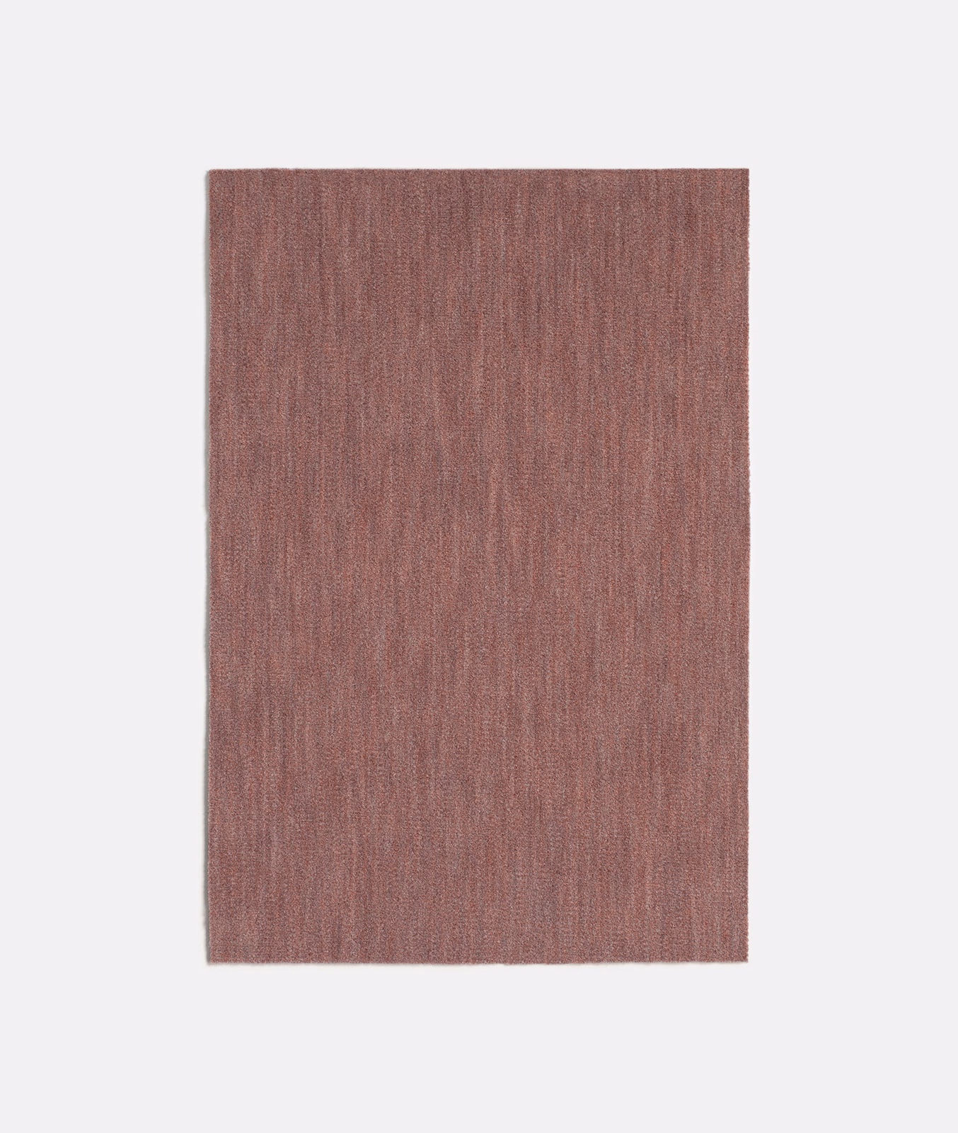 Dusty rose pink velvet swatch with fine vertical striations and subtle tonal depth