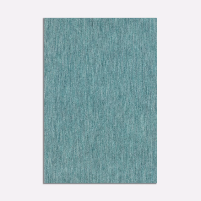 Close-up of cool seafoam green velvet with a softly brushed vertical nap