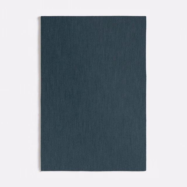 Deep blue-green velvet swatch with fine vertical nap and charcoal-teal shading