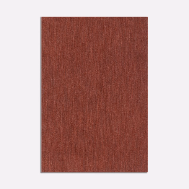 Deep terracotta velvet swatch with fine vertical tonal striations and soft brushed texture