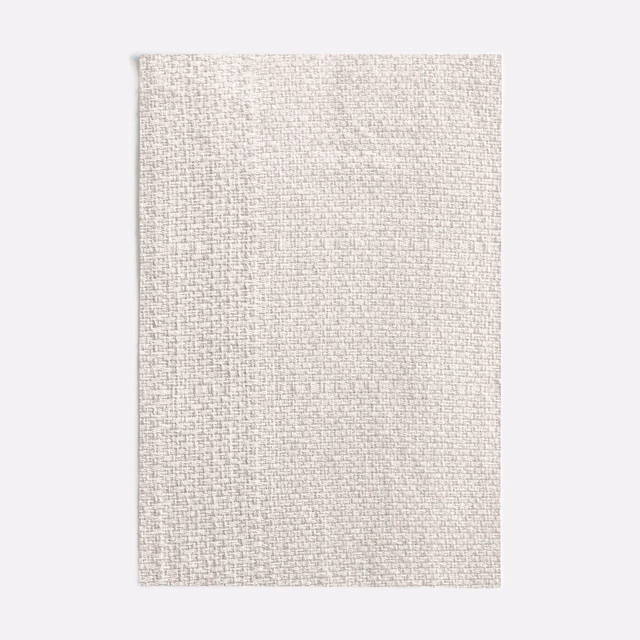 Close view of Calaluna Off White’s pale woven crosshatch texture