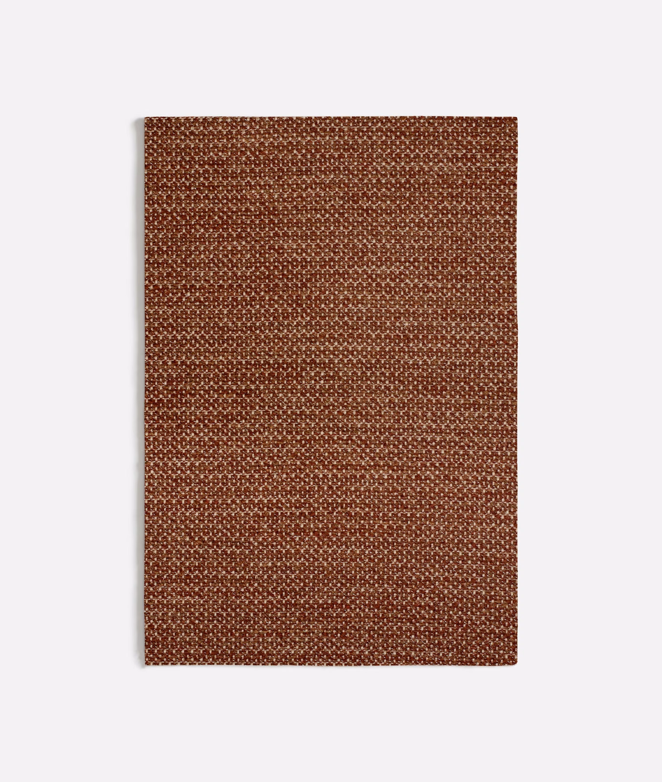 Dense terracotta woven textile with tiny looped texture and warm rust-brown shading