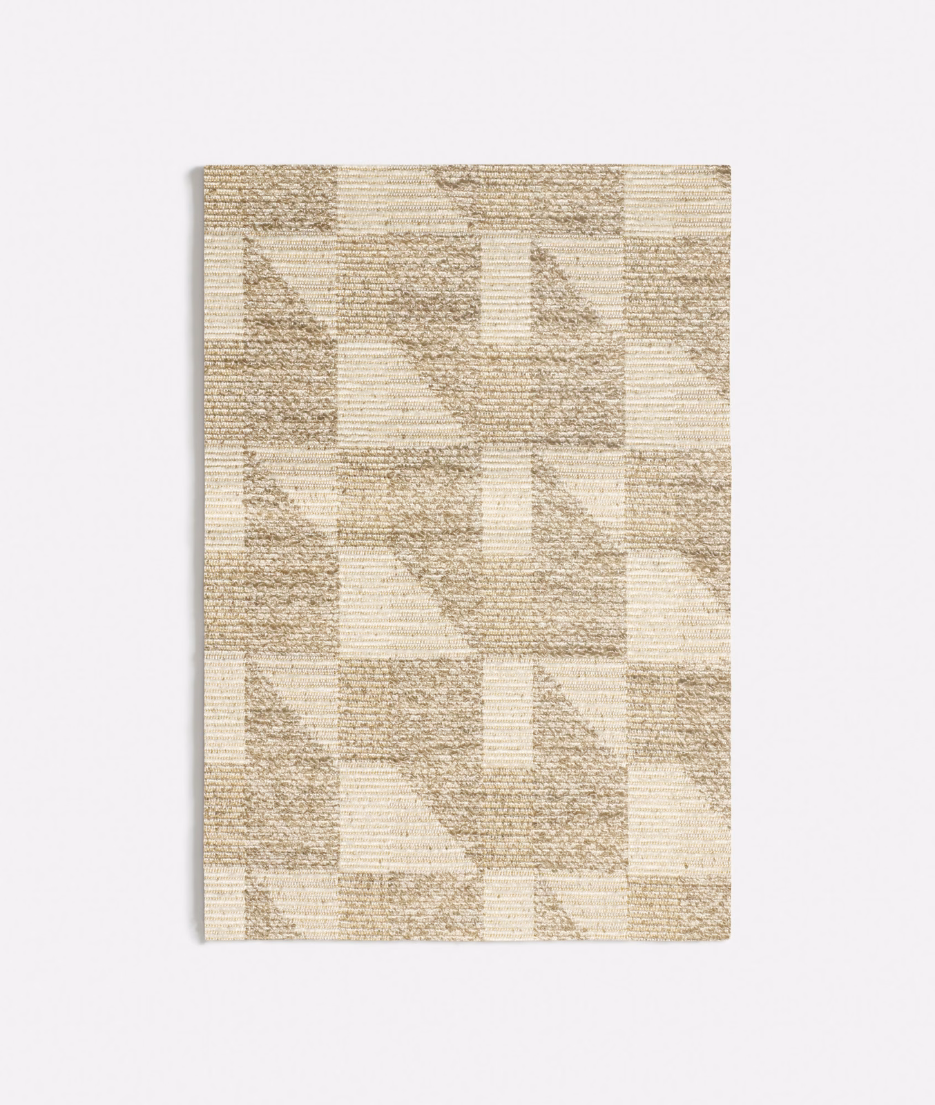 Warm ivory and taupe woven fabric with repeating geometric blocks and triangles
