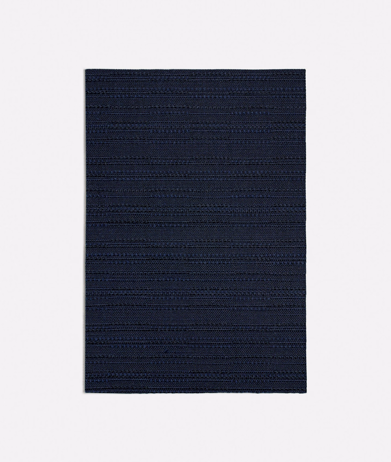 Deep navy swatch with fine horizontal ribbed weave and softly varied texture