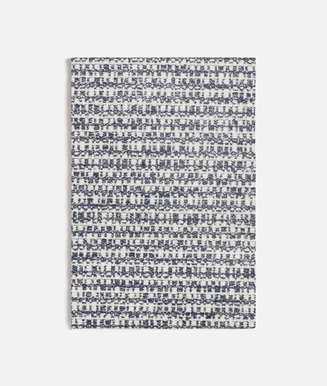Muted blue-grey woven swatch with broken horizontal rows and flecked texture