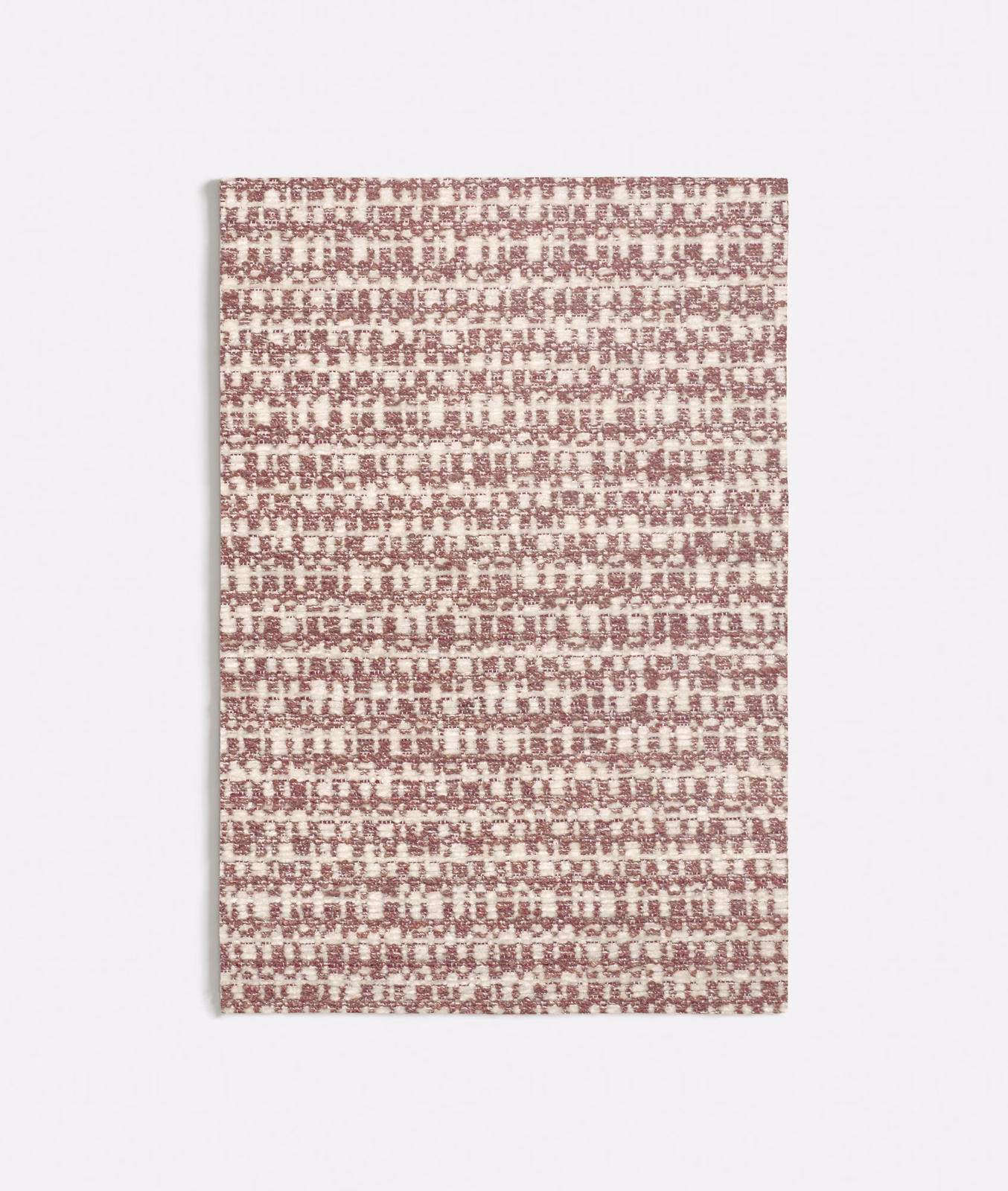 Dusty rose and ivory woven fabric with small broken horizontal rows