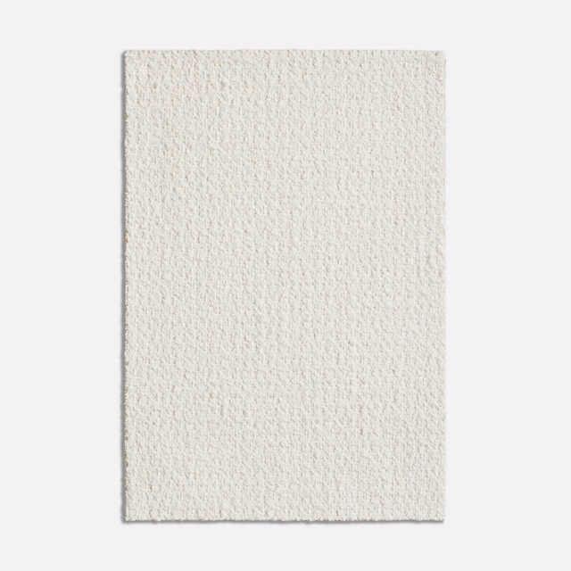 Warm ivory-white woven swatch with fine nubby texture and subtle shadowed depth