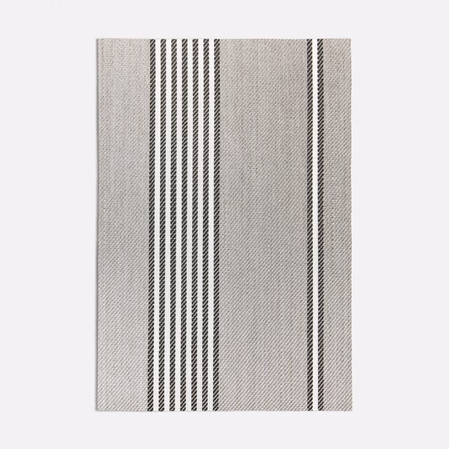 Cool grey woven fabric with grouped charcoal vertical stripes and fine textured surface