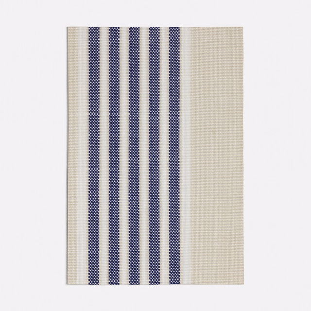 Pale ivory woven fabric with closely spaced vertical navy stripes