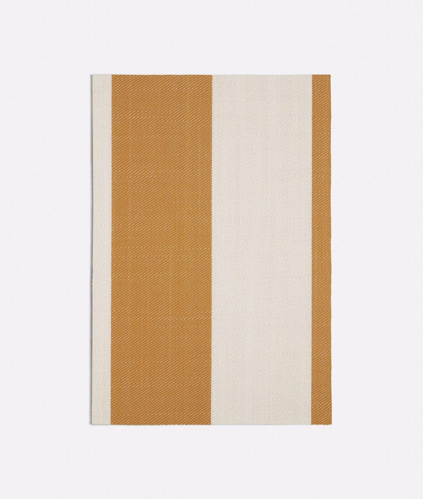 Close view of Chemin Yellow's broad ochre and ivory woven stripes