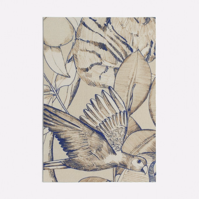 Warm beige fabric with indigo leaves and a flying bird illustration