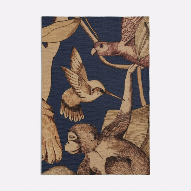 Deep navy fabric with sepia birds, cream wings and illustrated botanical foliage