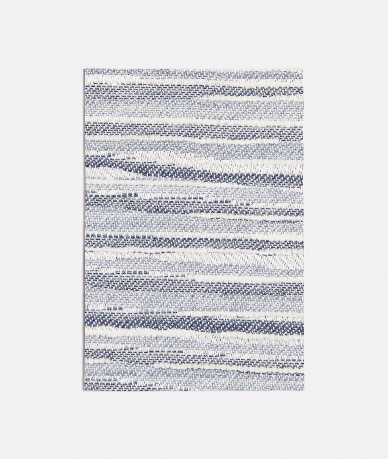 Cool navy and pale grey woven fabric with irregular horizontal bands