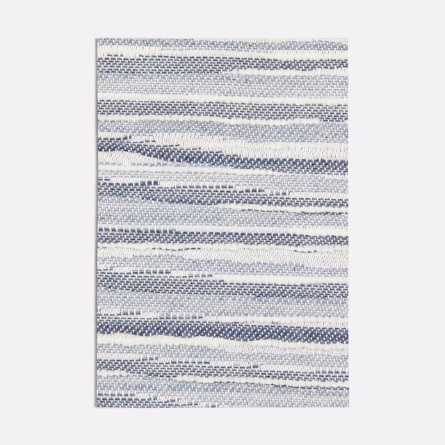 Cool navy and pale grey woven fabric with irregular horizontal bands