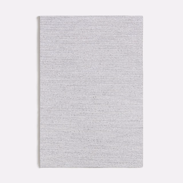 Pale cool-grey Corbello swatch showing a fine, subtly flecked horizontal weave