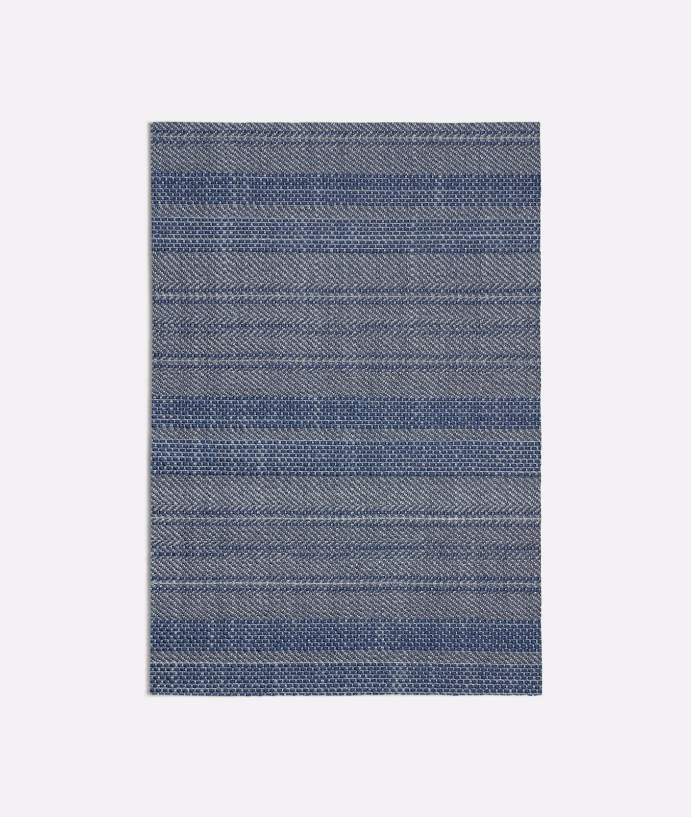 Cool blue-grey woven swatch with fine horizontal bands and chevron-like texture