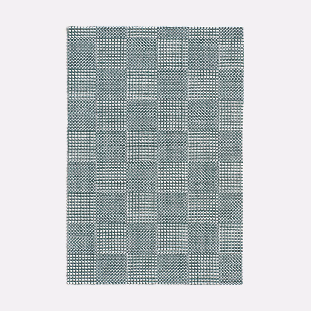Muted blue-grey woven check with tonal square blocks and fine textured grid