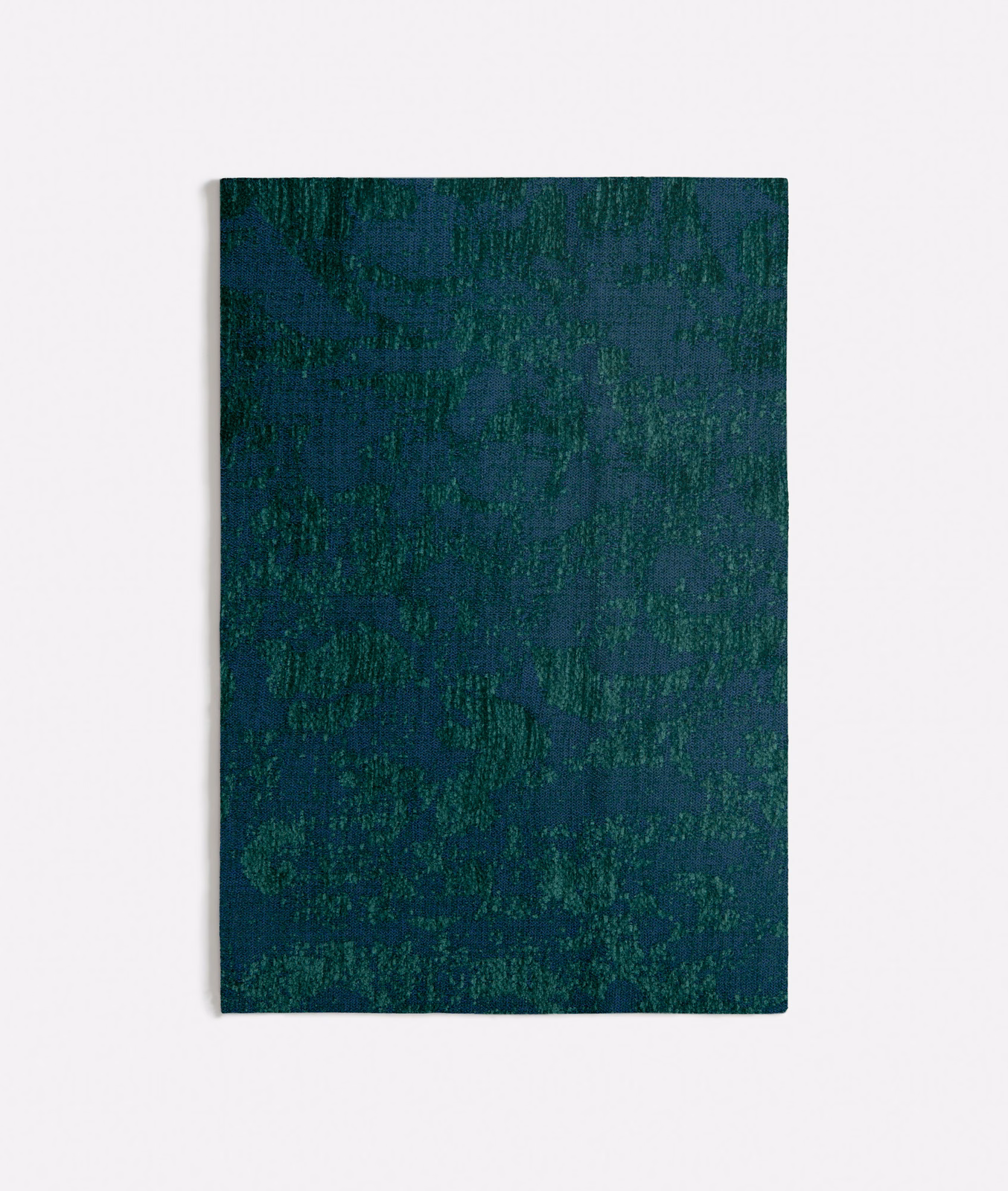 Deep teal seafoam textile with mottled green abstract texture and dense woven grain