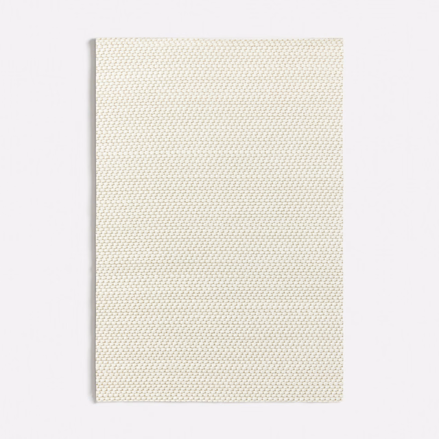 Pale beige Elicriso textile swatch with a tight, softly ridged woven surface