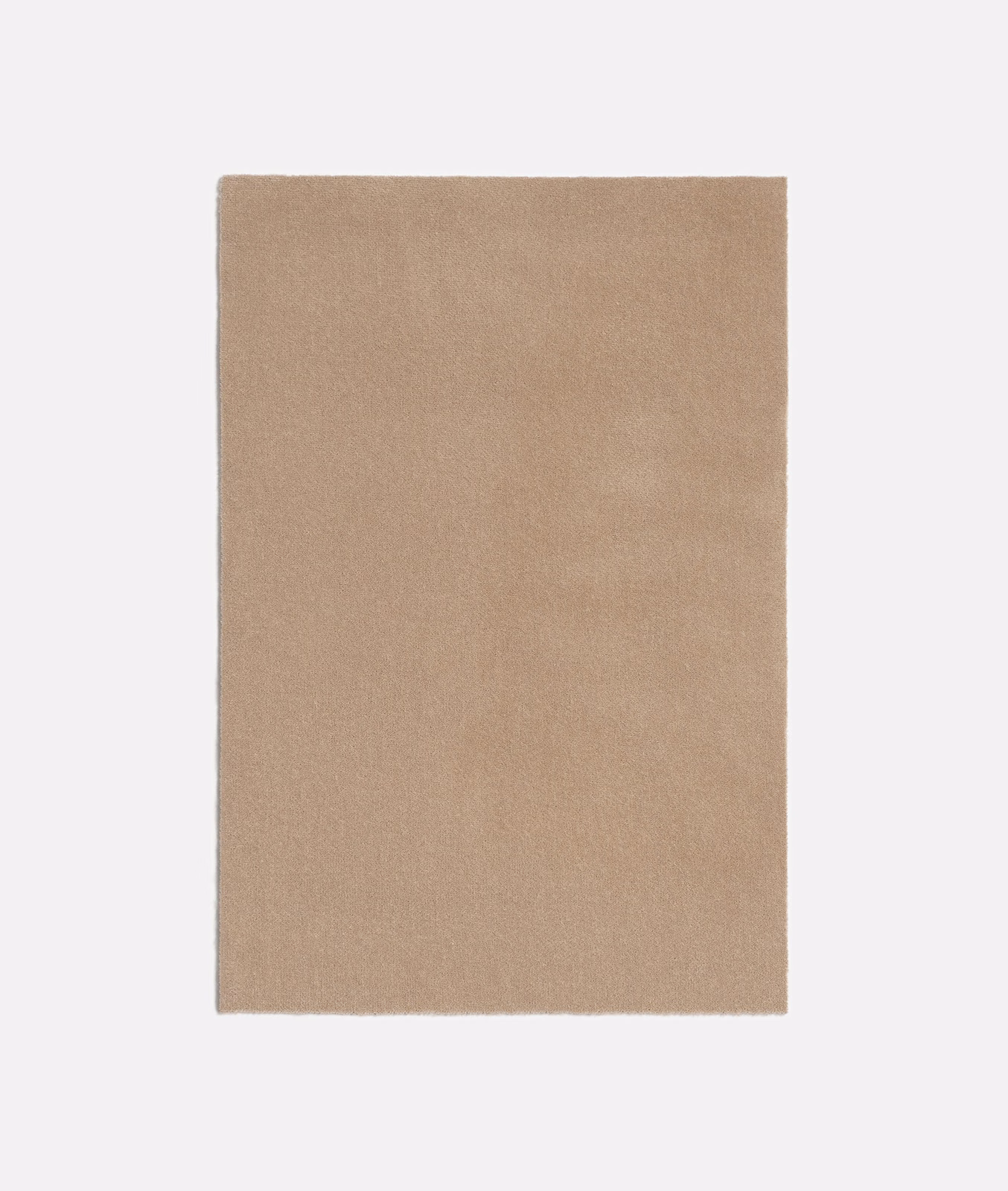 Warm oat-beige plain fabric with a fine, softly mottled woven surface