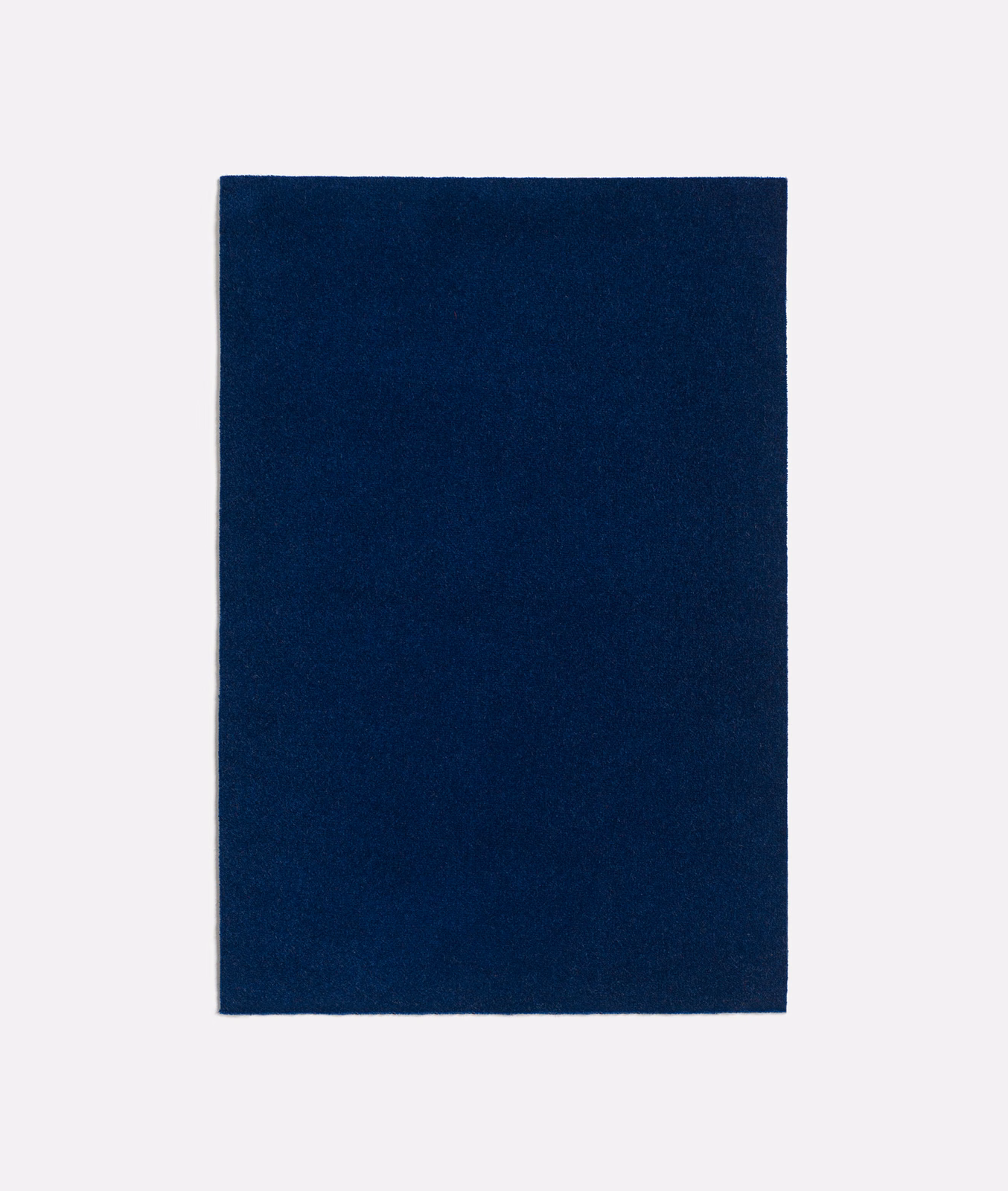 Deep navy swatch showing a fine, softly mottled surface texture