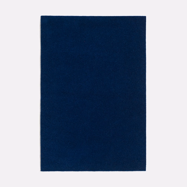 Deep navy swatch showing a fine, softly mottled surface texture