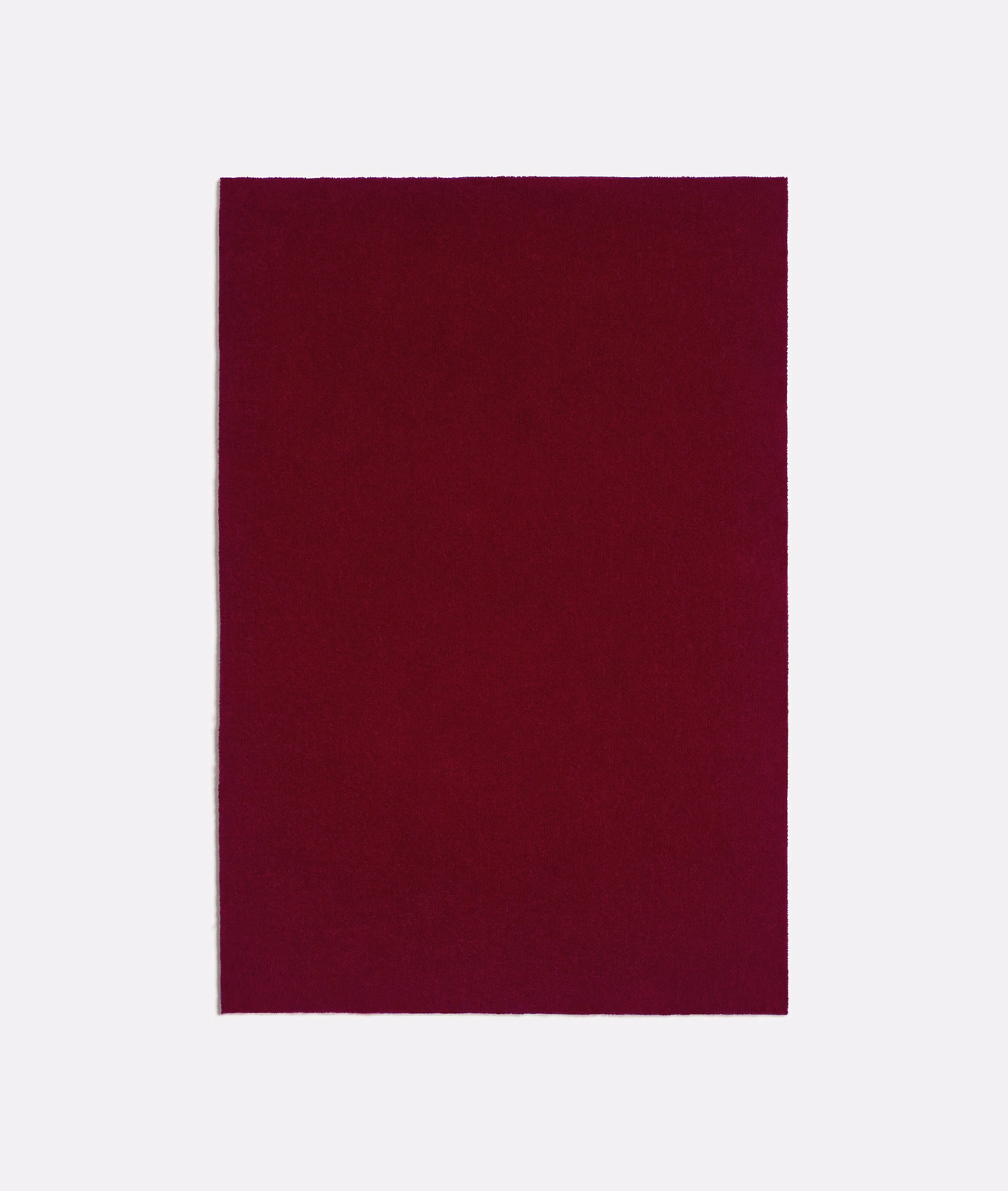 Deep Bordeaux textile swatch with a plain, subtly textured matte surface