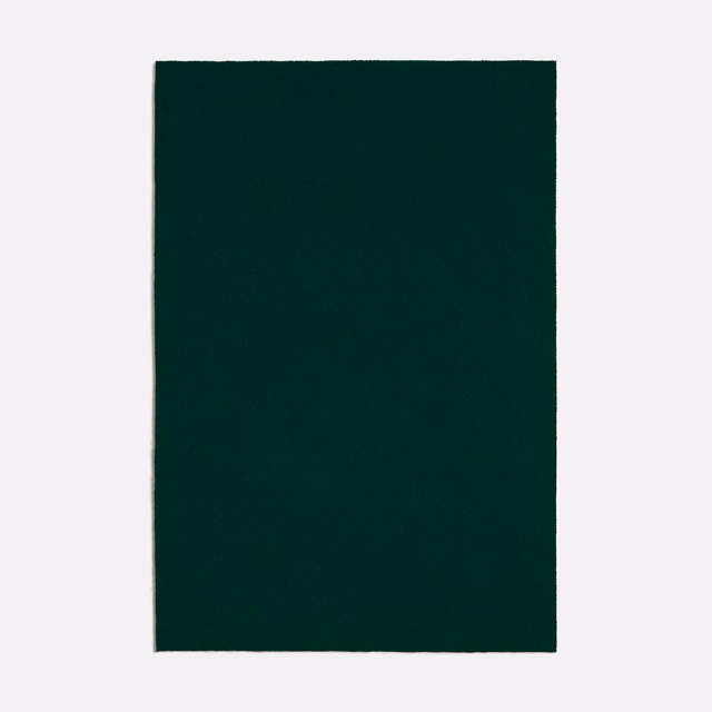 Deep forest-green plain fabric swatch with a subtly textured matte surface