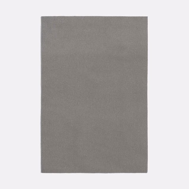 Muted taupe-grey plain weave with a finely textured, softly mottled surface