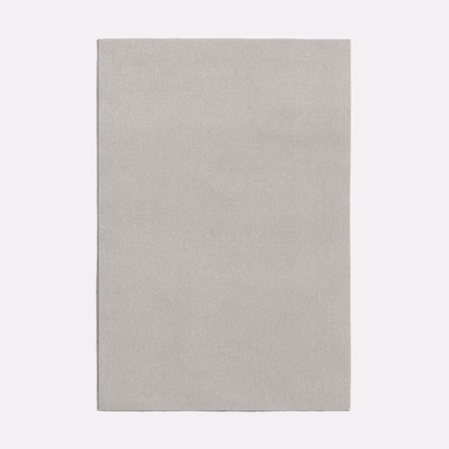 Pale stone-grey fabric swatch showing a fine, subtly mottled woven texture